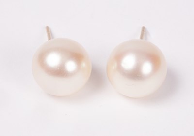 Lot 162 - A pair of pearl ear studs, the pearls 10mm in...