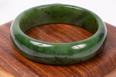 Lot 165 - A jade bangle, 63mm inner diameter,...