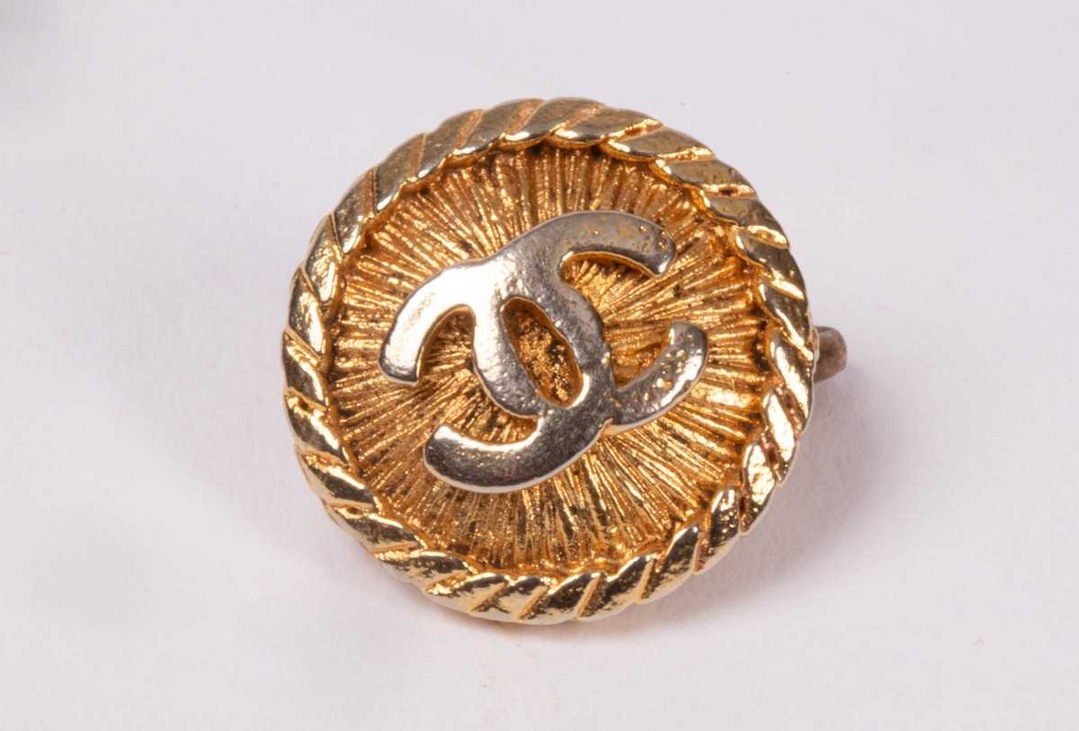 Lot 169 - A Chanel button, marked to reverse