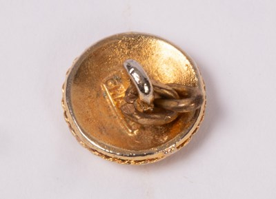 Lot 169 - A Chanel button, marked to reverse