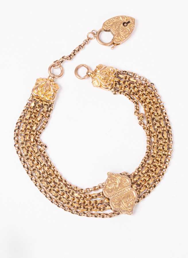 Lot 181 - A 9ct gold five chain bracelet, engraved...