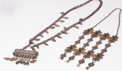 Lot 204 - Two Eastern white metal necklaces, one set...