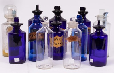 Lot 215 - Three apothecary blue glass drug jars and...