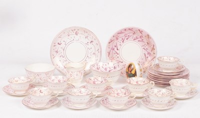 Lot 245 - A part pink lustre tea set, comprising: ten...