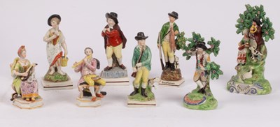 Lot 255 - A group of eight English pearlware figures, to...