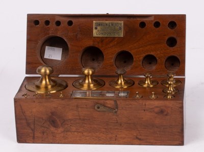 Lot 308 - A mahogany case of thirteen brass cylinder...