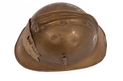 Lot 312 - A French fireman's brass helmet with crested...