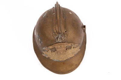 Lot 312 - A French fireman's brass helmet with crested...