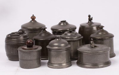 Lot 322 - Ten pewter tobacco jars, the tallest...