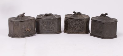 Lot 326 - Four Georgian lead tobacco jars, all with dog...