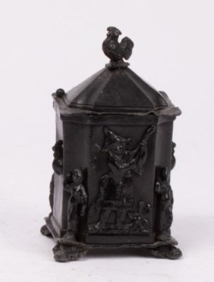 Lot 327 - A lead tobacco jar, with cockerel finial,...