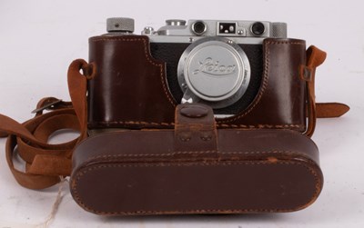 Lot 332 - A Leica camera, marked Leica D.R.P Ernst Leitz,...