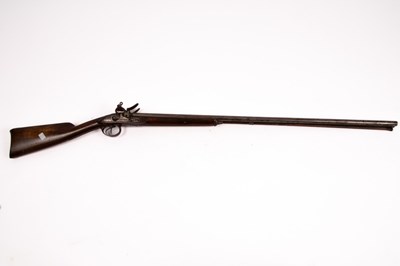 Lot 386 - A German double-barrel flintlock muzzle...