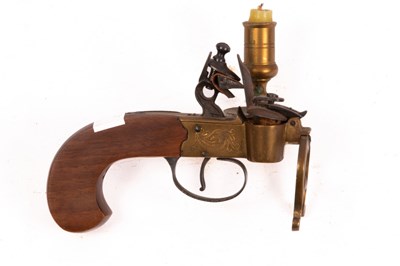 Lot 409 - A flintlock taper lighter with engraved plates...