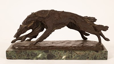 Lot 419 - A C Rose/A bronze depicting two running Borzoi...