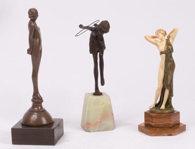 Lot 421 - Three Art Deco female figures, one bronze...