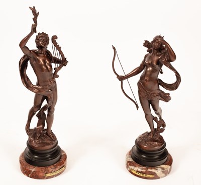 Lot 429 - A pair of bronzed metal figures, Diana and...