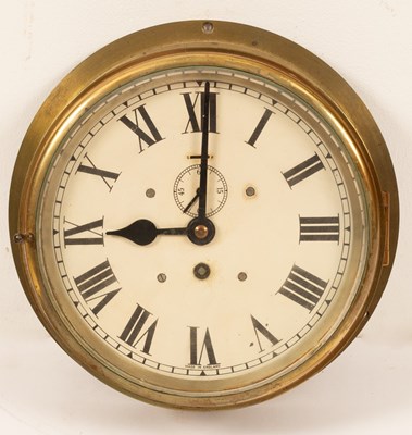 Lot 467 - A brass bulkhead timepiece with an 8 inch...