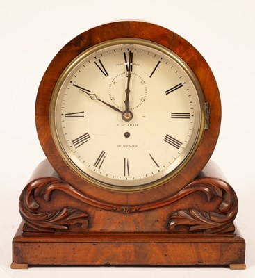 Lot 498 - A mahogany mantel timepiece of drumhead form,...