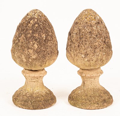 Lot 500 - A pair of reconstituted stone pineapple gate...