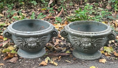 Lot 503 - A pair of circular garden vases, moulded...