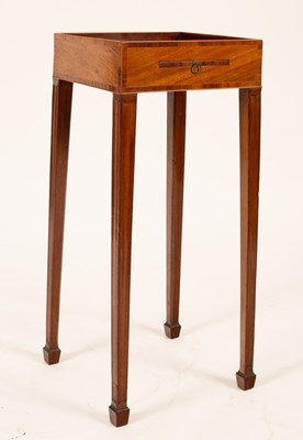 Lot 545 - A late George III mahogany urn stand, the...