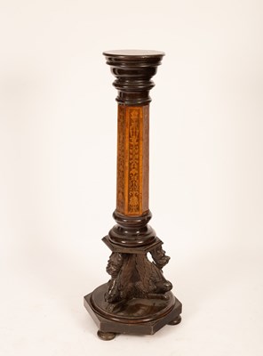 Lot 553 - An Edwardian torchère with ebonised circular...