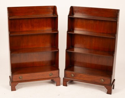 Lot 560 - A pair of mahogany waterfall front open...