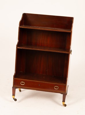 Lot 561 - A Regency mahogany waterfall front open...