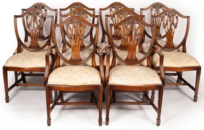 Lot 567 - Ten mahogany shield back dining chairs with...