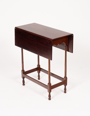 Lot 579 - A mahogany two-flap table on spindle turned...