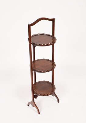 Lot 597 - An Edwardian mahogany folding cake stand,...