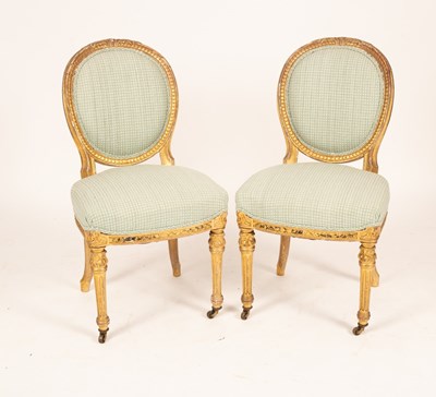 Lot 602 - A pair of gilt framed side chairs with oval...