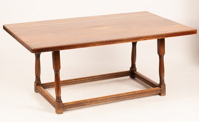 Lot 606 - An oak refectory type dining table, the oblong...