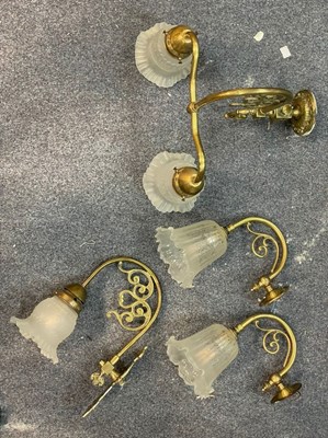 Lot 608 - A 20th Century brass two branch wall light...