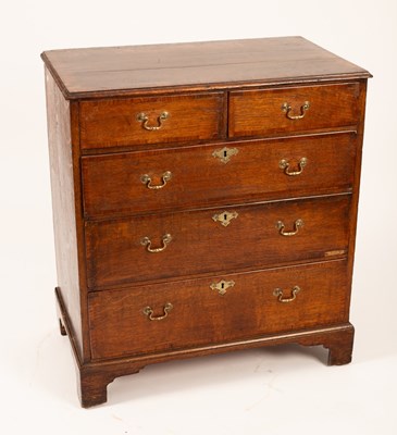 Lot 622 - A Georgian oak and elm chest crossbanded of...