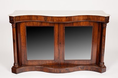 Lot 634 - A Victorian rosewood serpentine side cabinet,...