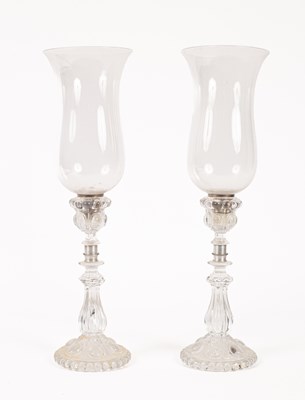 Lot 221 - A pair of 20th Century Baccarat glass hurricane lamps