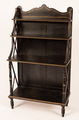 Lot 661 - A Regency style ebonised waterfall bookcase,...