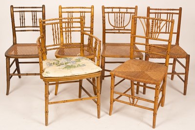 Lot 671 - Six faux bamboo chairs, four with cane seats,...