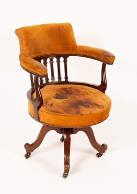 Lot 677 - An Edwardian swivel chair with galleried back...