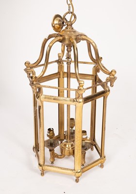 Lot 678 - A hexagonal hall lantern, 35cm wide x 62cm high