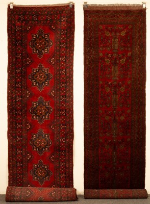 Lot 692 - A Bokhara runner, Afghanistan, the deep red...