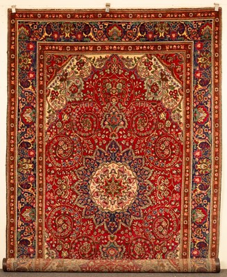 Lot 704 - A Tabriz carpet, North West Persian, the rich...