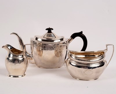 Lot 51 - A matched George III three-piece silver tea...