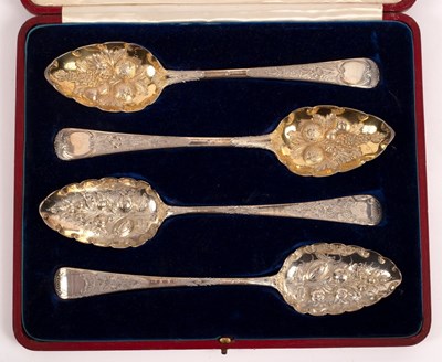 Lot 55 - Two pairs of George III silver berry spoons,...