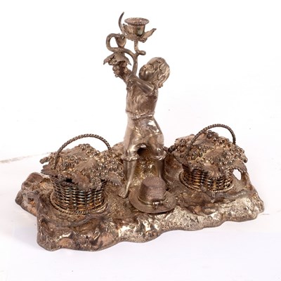 Lot 82 - A novelty plated inkstand modelled as a boy...