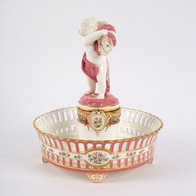 Lot 112 - A Minton pierced footed figural comport, circa...