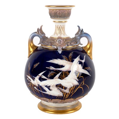 Lot 119 - A Royal Worcester blue ground two-handled...