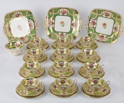 Lot 129 - A Coalport green ground part tea service,...